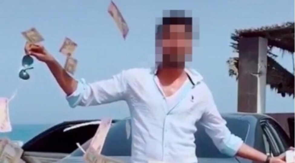 pul-paylayan-qehreman-hebs-edilib