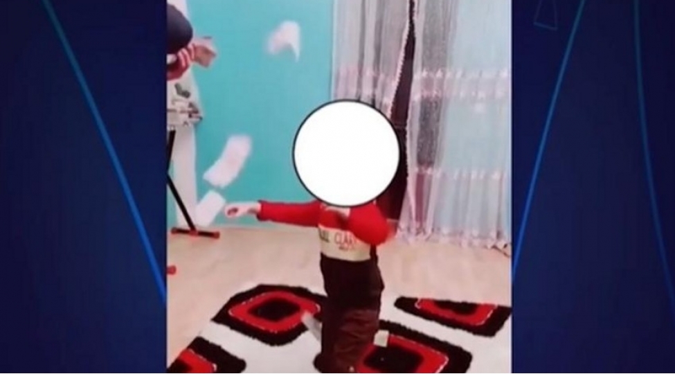 4-yashli-oglanasiqaret-chekdiren-shexs-cezalandirilib