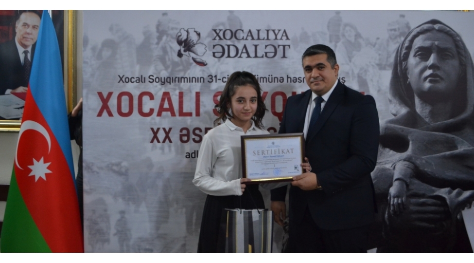 yap-nizami-rayon-teshkilatinda-xocali-soyqirimi-esrin-faciesi-adli-sergi-tedbir-kechirilib-foto