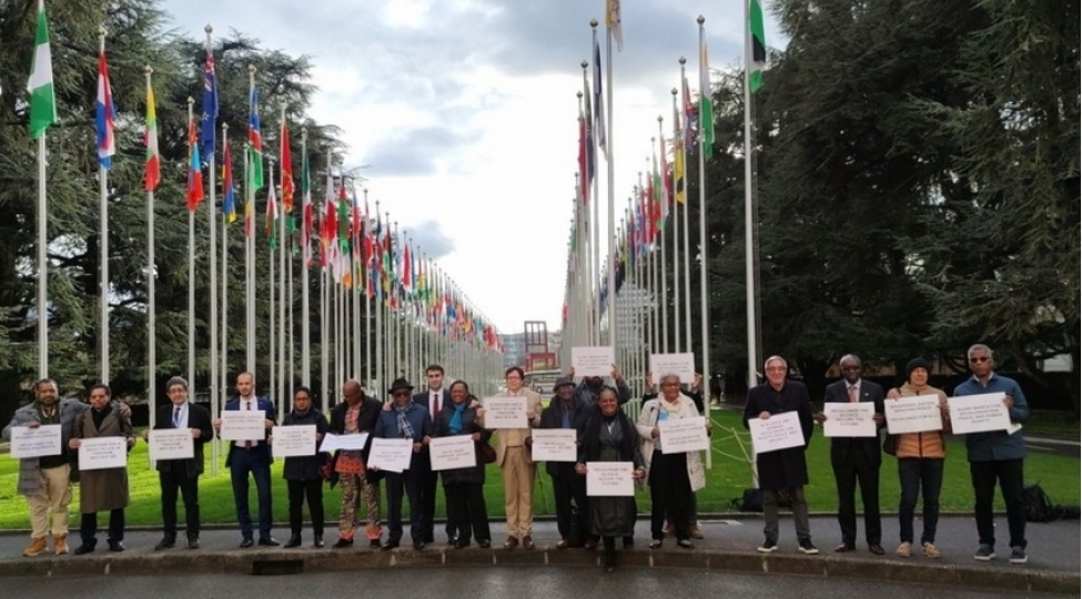 beynelxalq-konfransin-ishtirakchilari-cenevrede-fransa-mustemlekechiliyine-qarshi-dinc-aksiya-kechiribler-foto