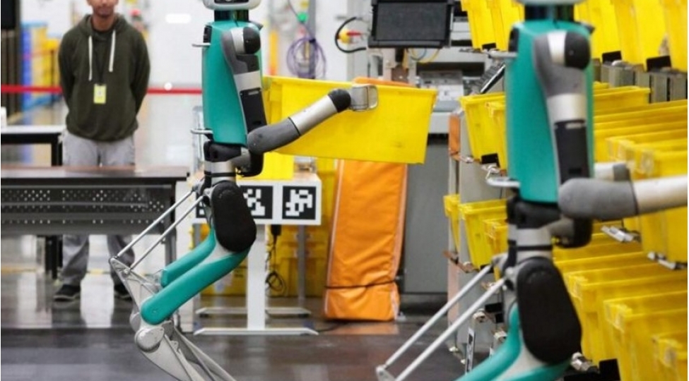 wsj-amazon-anbarlarinda-tezlikle-insanlardan-daha-chox-robot-olacaq